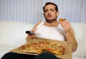man eating pizza