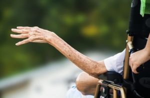 old man hand waving 