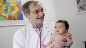 pediatrician with a baby 